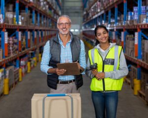 Portrait of warehouse workers working together in warehouse
